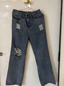Distressed Blue Denim Jeans