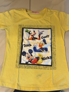 yellow Cartoon T-shirt and black sports lower
