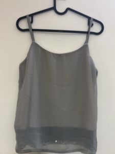 Multicolour reflecting sequin sleeveless top