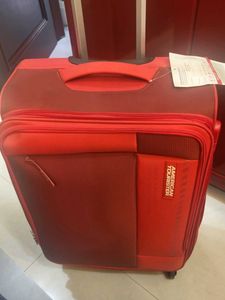 American Tourister Red Spinner Luggage