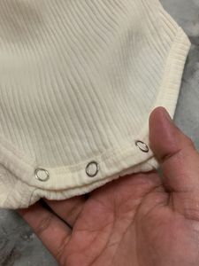 Cream Ribbed Long Sleeve Bodysuit