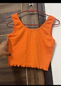 Vibrant Orange Ribbed Lettuce Hem Top