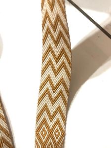 Stylish Crossbody Bag with Geometric Strap