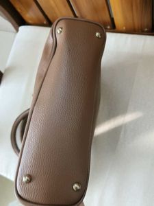 Chic Brown Handbag with V Accent