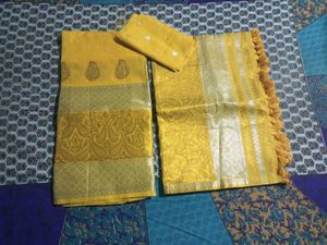 Elegant Yellow Saree with Intricate Gold Border
