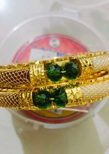 Brand new Elegant Gold Bangles with Red Stones