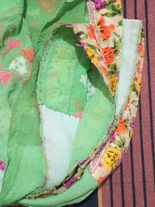 Beautiful Green Saree with Floral Embellishments