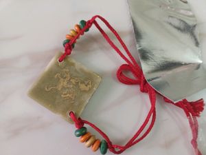 diamond shape resin rakhi with beads