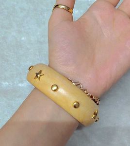 Trendy Wooden Bangles with Star Embellishments