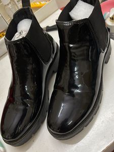 Shiny Black Chelsea Boots