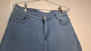 High-Waisted Raw Hem Flare Jeans.