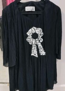 Elegant Black Tunic with Bow Detail