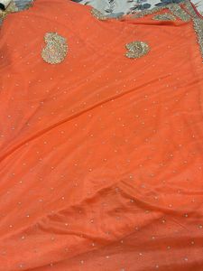 Stunning Orange Embroidered Saree