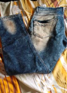 Distressed Blue Denim Jeans