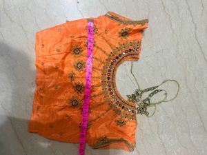 Orange Lehenga Choli with Blue Dupatta