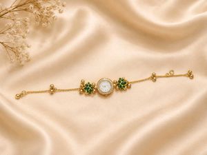 Elegant Gold and Emerald Bracelet Watch