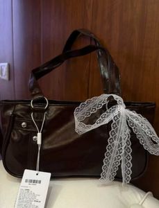 Brown shoulder bag with lace bow🎀👜
