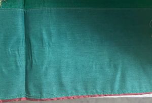 Elegant Teal Saree with Floral Motifs