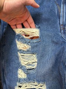 Distressed Blue Denim Jeans