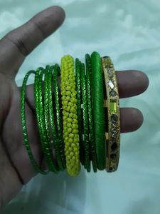 Set Of 13 Metal And Thread Fashion Bangles