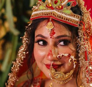 Elegant Gold Nath with Pearls &amp; Red Stones