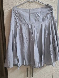 Light Blue Pleated Skirt with Button Detail