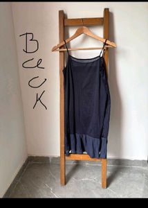 elegant Navy Slip Dress with Ruffle
