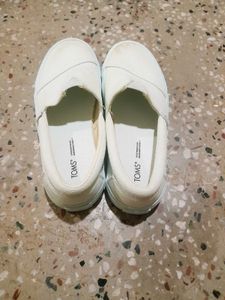 Classic White TOMS Slip-On Shoes