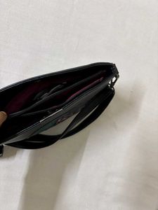 Black Leather Shoulder Bag with Lotus Design