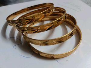 Elegant Gold Tone Bangle Set
