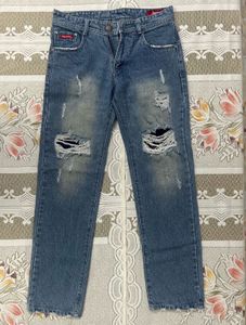 Supreme Distressed Blue Jeans