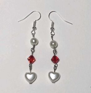 7 pairs of Y2K Heart + star earrings