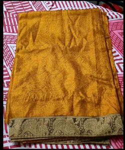 Beautiful Yellow Saree with Intricate Border