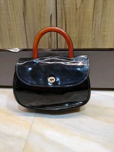 Chic Black Patent Handbag with Wooden Handle