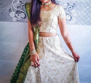 Cream Colour Lehenga Choli With Green Dupatta