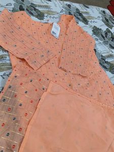 Peach Kurta with embroidery and golden lace work