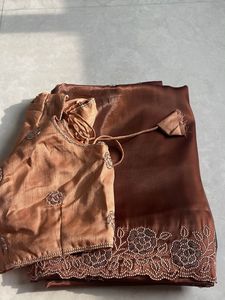 Elegant Brown Saree with Embellished Blouse