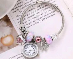 Charming Rose Gold Charm Bracelet Watch