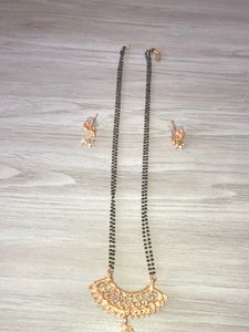Shining Golden Mangalsutra With Ear Tops Medium Length With Stones/Diamond