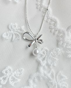 Delicate Bow Pendant Necklace
