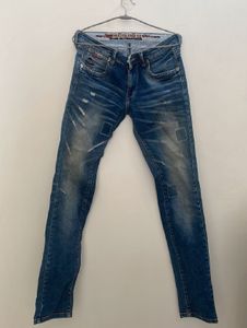 Distressed Denim Jeans