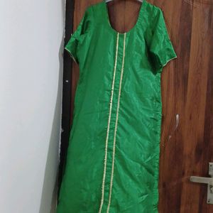 Green silk color kutra with lace in front. perfect for mending functions.  custom made..size 42.never worn
