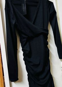 Chic Black Ruffled Mini Dress with tags