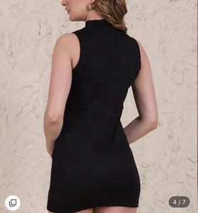 Sleek Black Mini Dress with Slit