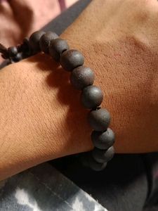 Black Bead Bracelet with Coin Charm