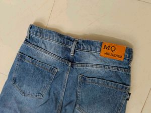 Distressed Blue Denim Jeans