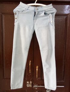 Light Wash Jeans with Button Detail