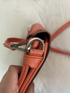 beautiful orange sling bag