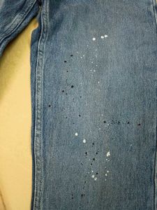 Stylish Blue Denim Jeans with Paint Splatter