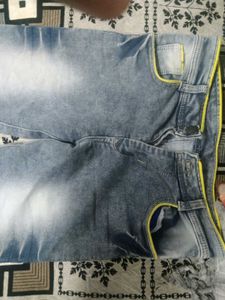 Stylish Blue Denim Jeans with Yellow Accent